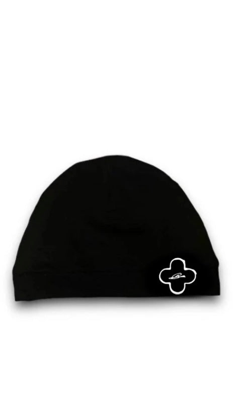 Black beanie with a white clover design on a white background